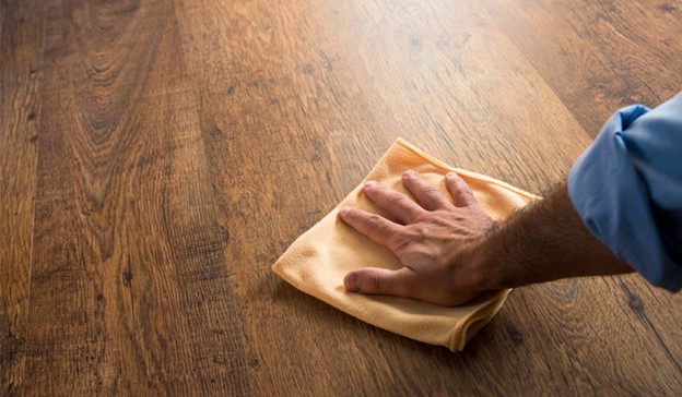 Why-In-House-Install-Installer Waxing hardwood Floor